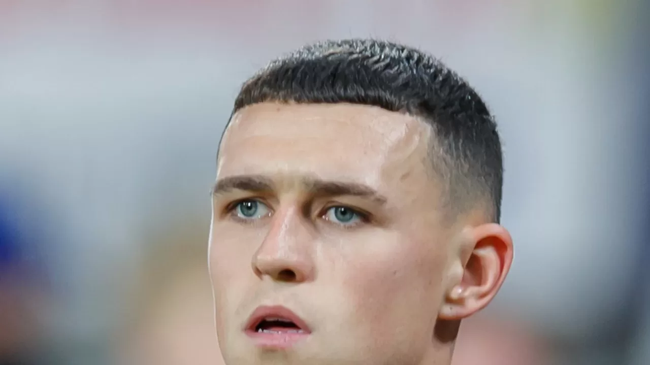 Phil Foden disputando un partido de Champions League con el Manchester City