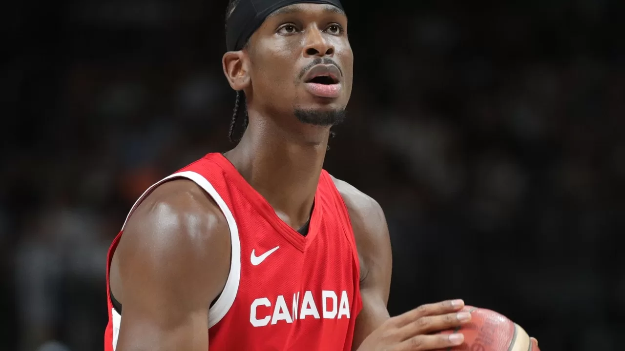 Shai Gilgeous-Alexander con el balon en un partido de baloncesto
