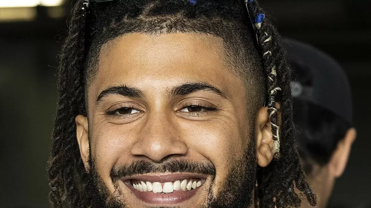 Fernando Tatis Jr., jardinero de los Padres de San Diego, sonriendo durante un evento con aficionados